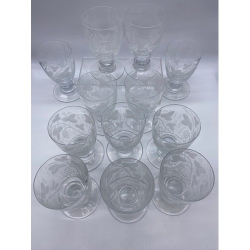 1506 - Set of twelve William Yeoward large crystal wine goblets, the bucket bowls engraved with vines land ... 