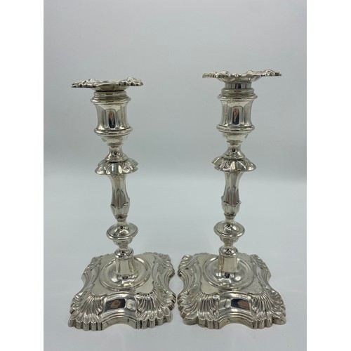 1001 - Pair of Georgian style Geo. V hallmarked Sterling silver candlesticks by William Hutton & Sons Ltd, ... 