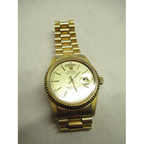 39A - gold plated fashion watch on gold plated bracelet