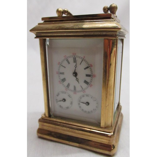 51A - C20th miniature lacquered brass carriage clock with white enamel dial and subsidiary dials for day a... 