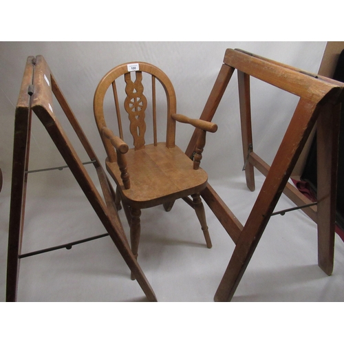 100 - C20th child's/dolls wheel and stickback beech chair and a pair of folding beech trestles