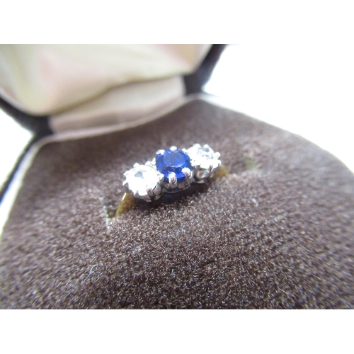 13 - C20th 18ct gold three stone Sapphire ring flanked by two diamonds Size J 1/2 gross 2.3g with certifi... 