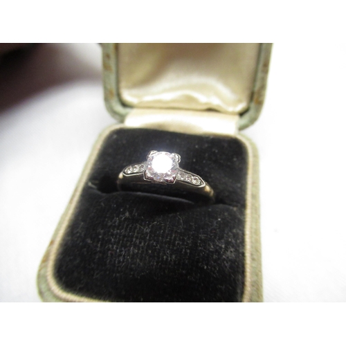 14 - Gold coloured solitaire diamond ring with six diamonds inset in mount Size M with resizer gross 1.5g