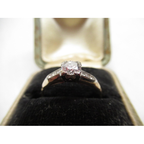 14 - Gold coloured solitaire diamond ring with six diamonds inset in mount Size M with resizer gross 1.5g