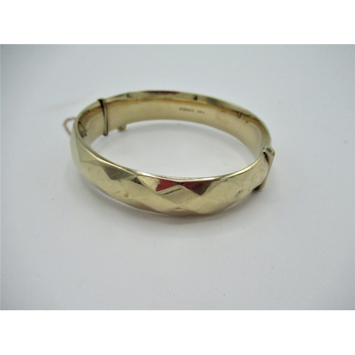 2 - Hallmarked 9ct gold geometric hinged bangle with safety chain Chester, 1961 diameter 6cm 19g