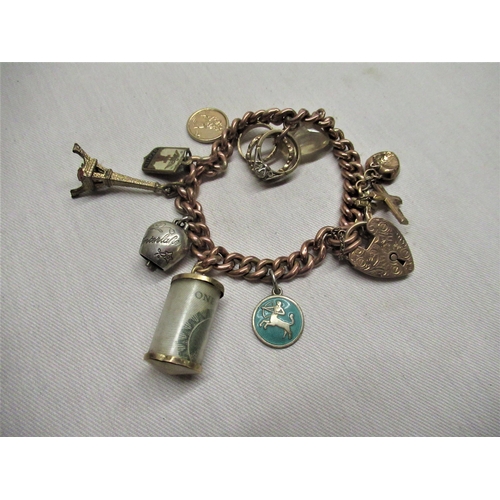24 - Hallmarked 9ct rose gold charm bracelet including anchor, cross, St Christopher, Sagittarius pendant... 