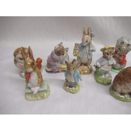 42 - Ten Beswick Beatrix Potter figurines including 