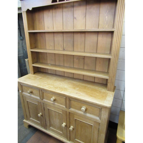 503 - 20th C Victorian style dresser with three open plate wrack shelves fluted side panels over three dra... 