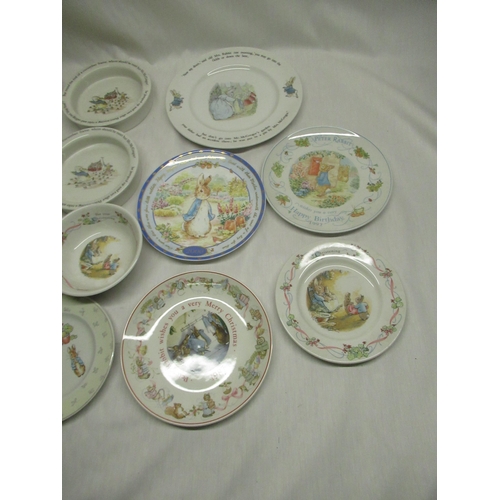 51 - Collection of boxed Peter Rabbit sweets and mints, paperweights, playing cards, etc