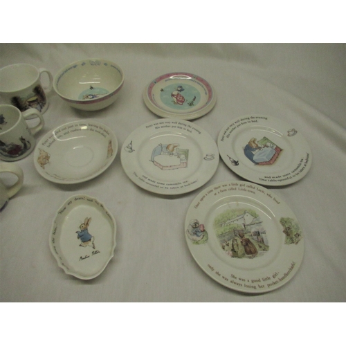 52 - Wedgwood Beatrix Potter plates, mugs and money box