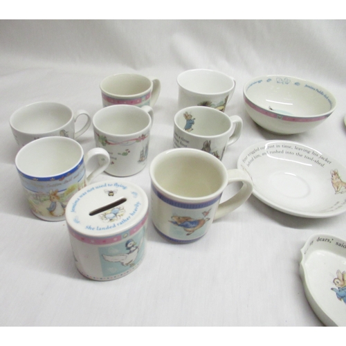 52 - Wedgwood Beatrix Potter plates, mugs and money box