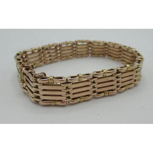 526 - 9ct gold five bar gate bracelet with a box clasp and belcher safety chain stamped 9C L19cm 22.5g