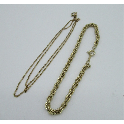 530 - 9ct gold chain necklace with spring ring clasp stamped 9ct L40 and a yellow gold (unmarked0 rope cha... 