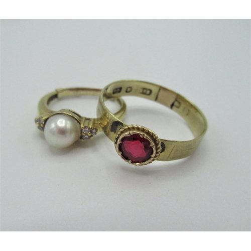 534 - 9ct gold ring with central pearl mounted with six diamonds size L (with resizer), hallmarked 9ct gol... 