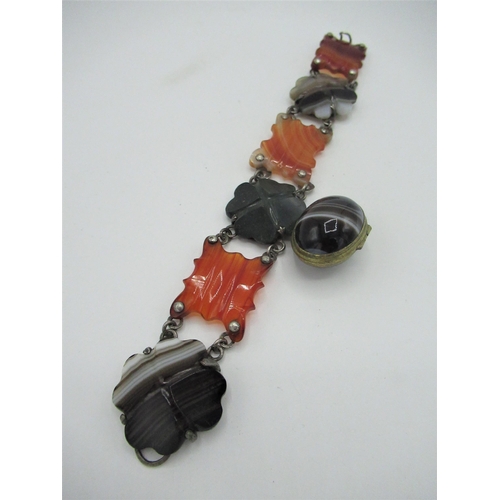 540 - Scottish banded agate bracelet with hook clasp and a banded agate egg shaped locket