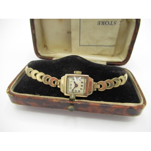 547 - C20th Swiss ladies hand wound wristwatch 9ct gold case on gold coloured bracelet 15 jewel Swiss made... 