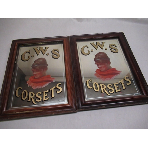 558 - C.W.S., Corsets pair of early C20th advertising mirrors in molded rosewood grained frames W31.5cm H4... 