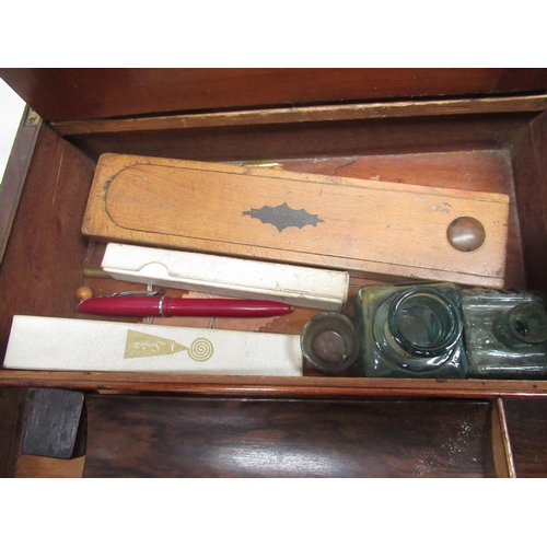 565 - Victorian inlaid walnut writing box ,containing a selecting on writing equipment, makling ware match... 