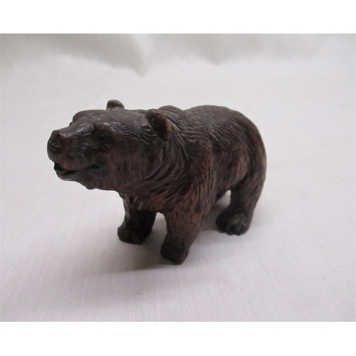 574 - Early C20th black forest carved wood model of a bear H7cm