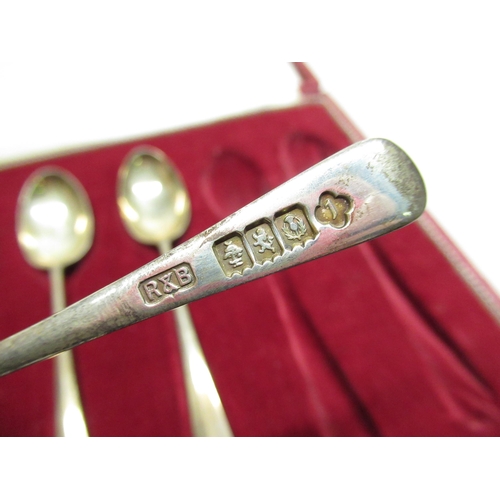 584 - ER II cased set of British hallmarks silver tea spoons (one missing), and a button hook with silver ... 