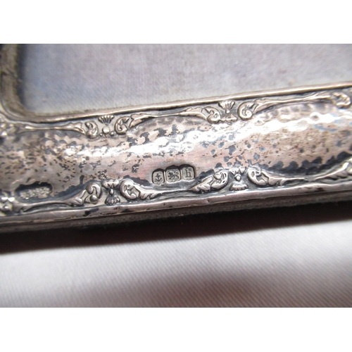 585 - Edw.VII silver photograph frame with scrolled border, Birmingham 1907 W12cm H18.25cm