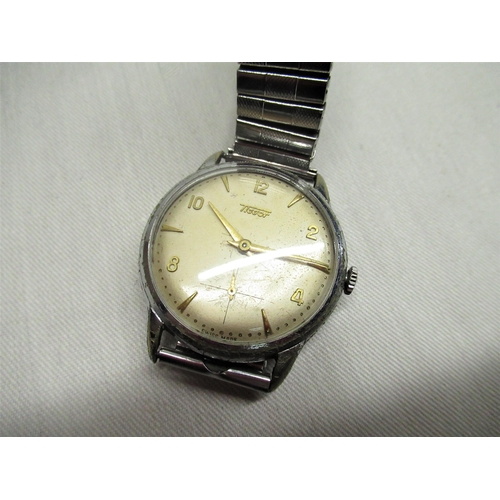 61 - 1950's Tissot hand wound wristwatch, chrome plated case on later everflex strap, snap on stainless s... 