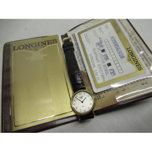 62 - Ladies Longines Presence quartz wristwatch, gold plated case on brown leather strap with original Lo... 