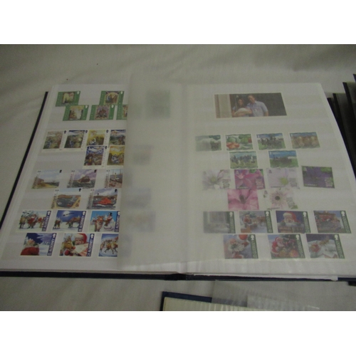 70 - Three stamp albums relating to Guernsey and Alderney