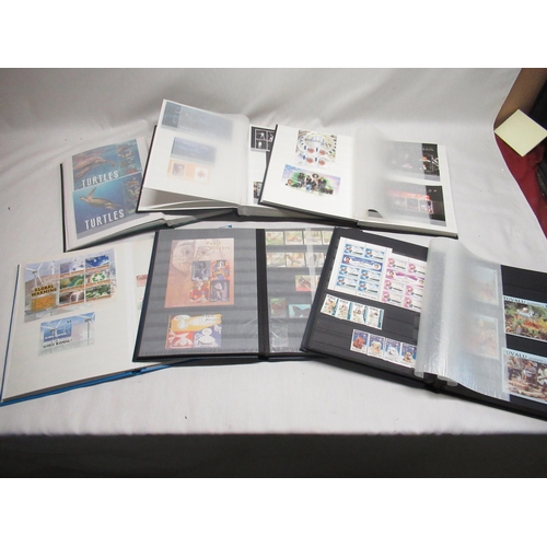 78 - Six stamp albums relating to Tuvalu