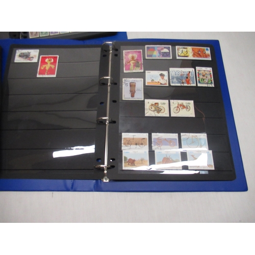 79 - Three stamp albums relating to Russia, Soviet Union, DDR, and the SAAR Protectorate