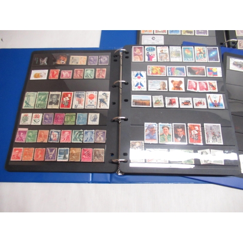 79 - Three stamp albums relating to Russia, Soviet Union, DDR, and the SAAR Protectorate