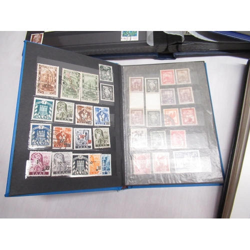 80 - Four stamp albums relating to Russia, Soviet Union, DDR, and the SAAR Protectorate