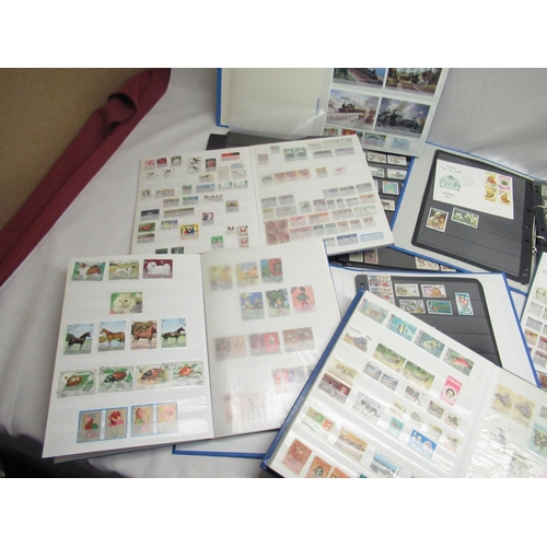 82 - Nine stamp albums relating to African countries incl. Guyana, South Africa, Kenya etc