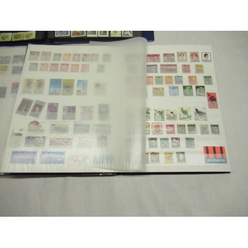 84 - Three stamp albums relating to Australia and New Zealand