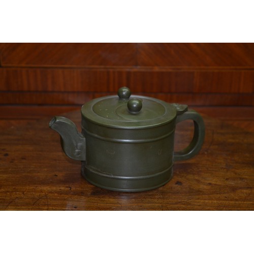 475 - Chinese pottery teapot, green glaze cylindrical body with loop handle, cover with two ball handles, ... 