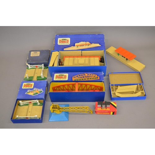 198 - Box containing a number of Hornby Dublo accessories including track, platforms etc.