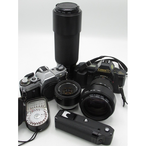 76 - Canon AE1 35mm SLR camera body (boxed), a Canon T70 with Canon 35-105 lens (boxed), a Canon A winder... 