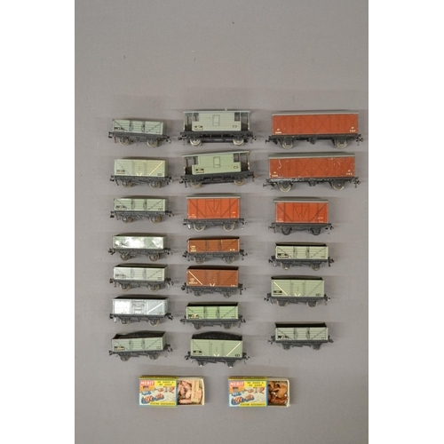 195 - Box containing over seventy Hornby Dublo carriages and freight wagons etc some boxed.