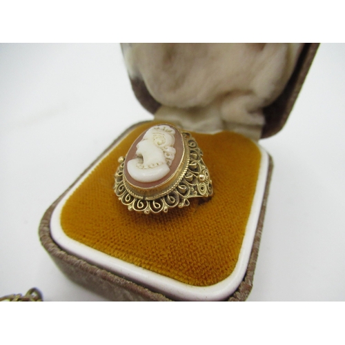 107 - Cameo brooch in filigree mount, a cameo ring in filigree mount size Q, a pair of cameo screw clasp, ... 
