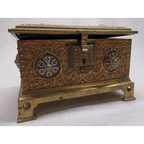 115 - Victorian gilt brass rectangular jewellery casket, all over relief decorated with scrollwork and col... 
