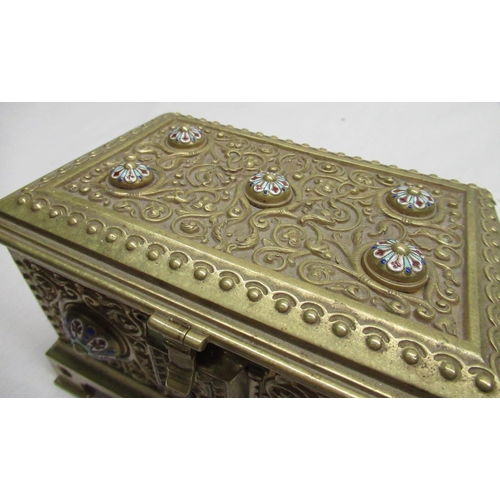 115 - Victorian gilt brass rectangular jewellery casket, all over relief decorated with scrollwork and col... 