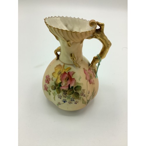 120 - Early C20th Royal Worcester jug, coral handle and blush ivory ground decorated with roses with gilt ... 