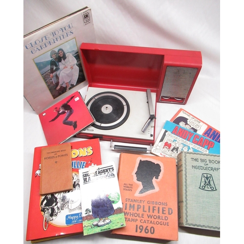 494 - Phillips battery portable record player in red plastic case, 33RPM records, comics and other referen... 
