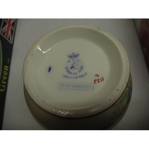 596 - Early C20th Carlton ware tobacco jar, blush ground with cobalt blue rim with gilt highlights H13cm, ... 