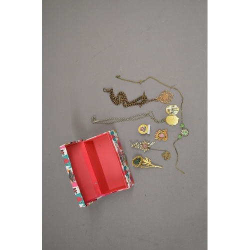 589 - Metal tin and small cardboard box with costume jewellery and a glass paper weight