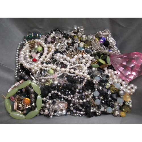 124 - Collection of costume jewellery  including simulated pearls and other beaded necklaces