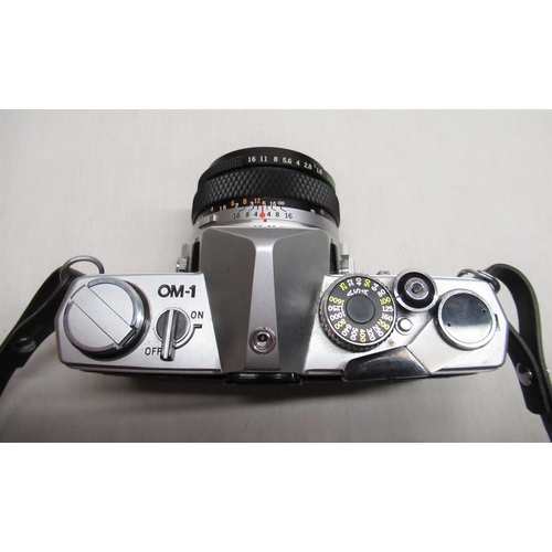 150 - Olympus OM-1 35mm camera with 1:1.8 Olympus lens, serial number 1367490, with Olympus Original Ever ... 