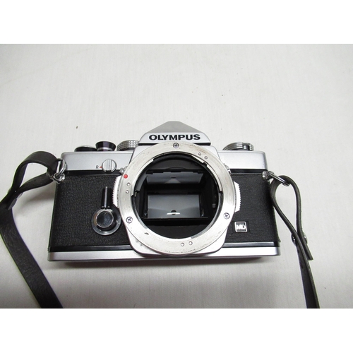 150 - Olympus OM-1 35mm camera with 1:1.8 Olympus lens, serial number 1367490, with Olympus Original Ever ... 