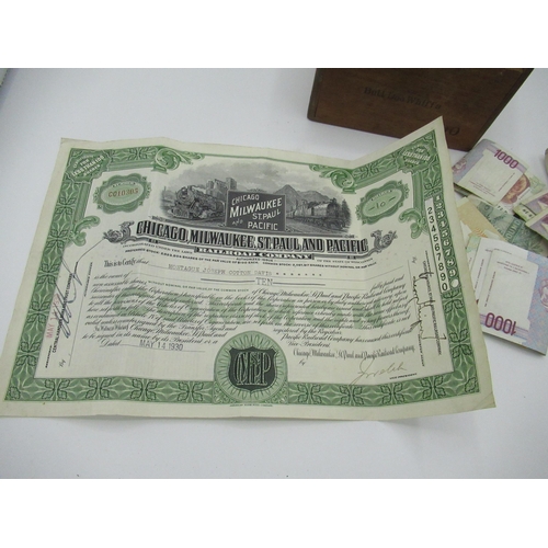 168 - Cigar box of coins, notes and a Chicago Milwaukee, St Paul and Pacific Railroad Company stock bond c... 