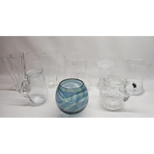 180 - Eight large glass vases and jugs